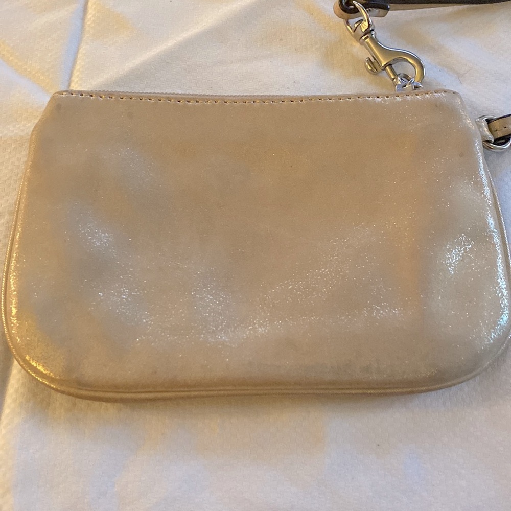 Gold coach wristlet